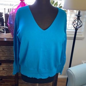 Turquoise sweater with button detailing
